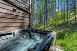Soak in the hot tub after a day of adventure 